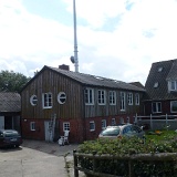 our QTH with commercial Telekom tower in the background